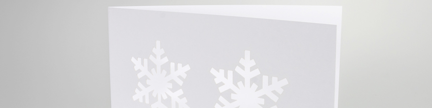 Hochwei&szlig;e Karte, geklappt, filigrane Laserstanzung, kein Druck